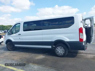 2023 Ford Transit Passenger XL with VIN 1FBAX2YG6PKB08879, listed as a IAAI auction lot 42137671 with 44,204 mi miles. Bid and sale history available at carsss.com. Image 14.