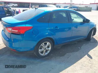 2014 Ford Focus SE with VIN 1FADP3F29EL122925, listed as a IAAI auction lot 42044004 with 216,490 mi miles. Bid and sale history available at carsss.com. Image 4.