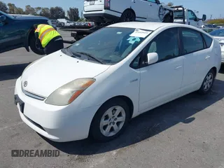 2006 Toyota Prius with VIN JTDKB20UX67527206, listed as a IAAI auction lot 42093925 with 124,256 mi miles. Bid and sale history available at carsss.com. Image 2.