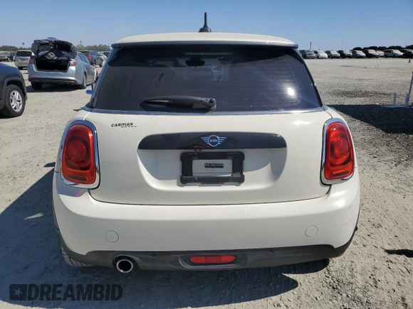 2020 MINI Hardtop Cooper with VIN WMWXR3C02L2M26554, listed as a Copart auction lot 64797225 with 35,180 mi miles and Salvage title. Bid and sale history available at DreamBid. Image 6.