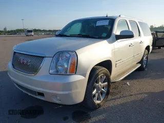 2012 GMC Yukon XL Denali with VIN 1GKS1MEF6CR138320, listed as a IAAI auction lot 42123524 with 184,182 mi miles. Bid and sale history available at carsss.com. Image 2.