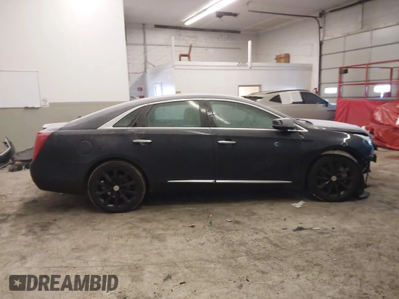 2013 Cadillac XTS Luxury with VIN 2G61P5S34D9200849, listed as a IAAI auction lot 41412189 with 134,932 mi miles. Bid and sale history available at carsss.com. Image 13.