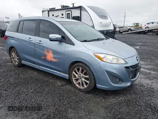 2013 Mazda 5 Grand Touring z VIN JM1CW2DL2D0153982, wystawiony jako IAAI lot #41857697 z przebiegiem 98 053 mil mil oraz . Historia ofert i sprzedaży dostępna na DreamBid. Obrazek 1.