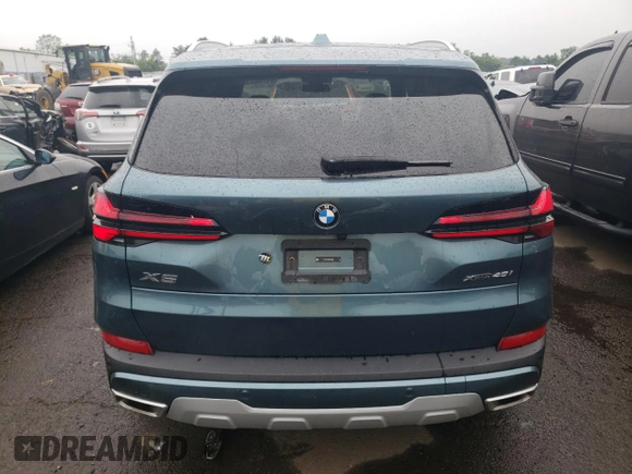 2024 BMW X5 xDrive40i with VIN 5UX23EU02R9T63818, listed as a Copart auction lot 60195525 with 26,773 mi miles and Salvage title. Bid and sale history available at DreamBid. Image 6.
