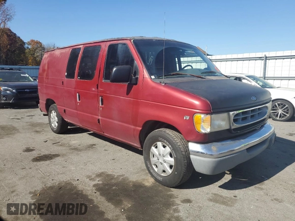 1999 Ford Econoline Cargo with VIN 1FDRE14W1XHB36383, listed as a Copart auction lot 77230084 with 222,420 mi miles and Salvage Title. Bid and sale history available at carsss.com. Image 4.