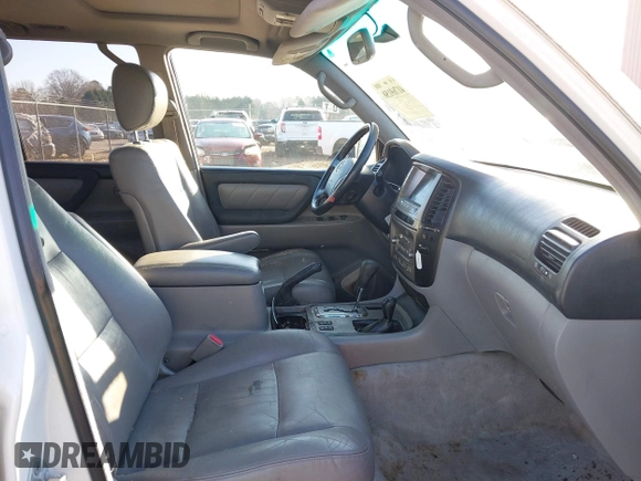 2005 Toyota Land Cruiser z VIN JTEHT05J952078683, wystawiony jako IAAI lot #41769150 z przebiegiem 299 737 mil mil oraz . Historia ofert i sprzedaży dostępna na DreamBid. Obrazek 5.