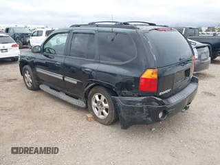 2003 GMC Envoy SLT z VIN 1GKDS13S232298062, wystawiony jako IAAI lot #41668380 z przebiegiem 195 045 mil mil oraz . Historia ofert i sprzedaży dostępna na DreamBid. Obrazek 3.