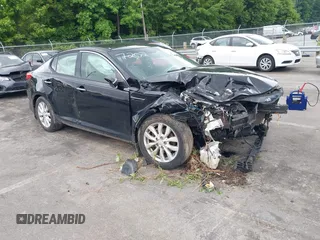 2015 Kia Optima EX z VIN 5XXGN4A7XFG417202, wystawiony jako IAAI lot #42384510 z przebiegiem 175 888 mil mil oraz . Historia ofert i sprzedaży dostępna na DreamBid. Obrazek 1.