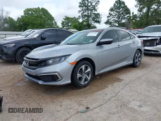 2019 Honda Civic LX with VIN 19XFC2F60KE043806, listed as a IAAI auction lot 41915894 with 123,141 mi miles and . Bid and sale history available at DreamBid. Image 18.