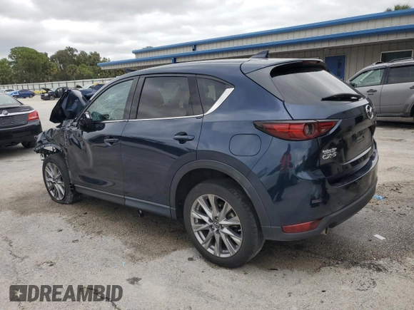 2021 Mazda CX-5 Grand Touring with VIN JM3KFADM9M0401778, listed as a Copart auction lot 46227515 with 44,587 mi miles and Non Repairable. Bid and sale history available at carsss.com. Image 2.