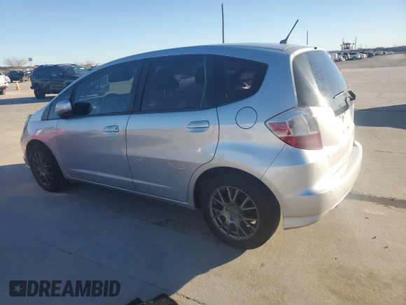 2013 Honda Fit with VIN JHMGE8H31DC036859, listed as a Copart auction lot 87079274 with 112,160 mi miles and Salvage Title. Bid and sale history available at carsss.com. Image 2.