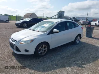 2013 Ford Focus SE with VIN 1FADP3F23DL208410, listed as a IAAI auction lot 42542892 with 111,392 mi miles and . Bid and sale history available at DreamBid. Image 2.