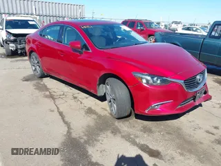 2016 Mazda 6 i Grand Touring с VIN JM1GJ1W50G1430328, выставлен на аукционе IAAI как лот 41879262 с пробегом 122 545 миль миль и . История ставок и продаж доступна на DreamBid. Изображение 1.