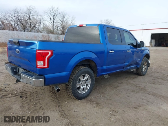 2015 Ford F-150 XLT with VIN 1FTEW1EPXFFC55583, listed as a IAAI auction lot 40903363 with 149,583 mi miles. Bid and sale history available at carsss.com. Image 4.