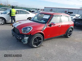 2015 MINI Cooper Countryman S with VIN WMWZC5C51FWP49282, listed as a IAAI auction lot 40698179 with 63,037 mi miles. Bid and sale history available at carsss.com. Image 18.