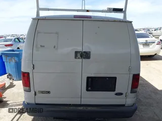 2004 Ford Econoline Cargo with VIN 1FTRE14W44HA29084, listed as a IAAI auction lot 41793350 with 123,429 mi miles. Bid and sale history available at carsss.com. Image 16.