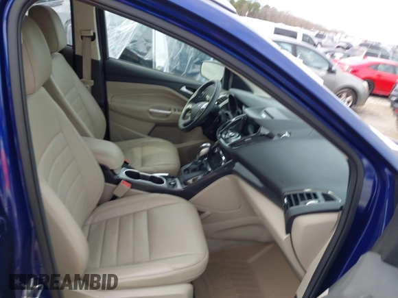 2016 Ford Escape Titanium with VIN 1FMCU9JXXGUA71898, listed as a IAAI auction lot 41758284 with 51,935 mi miles. Bid and sale history available at carsss.com. Image 5.
