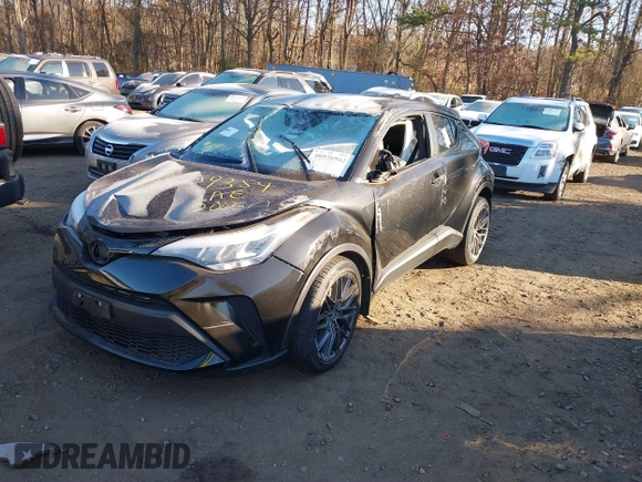 2021 Toyota C-HR LE with VIN JTNKHMBX1M1118203, listed as a IAAI auction lot 40936962 with 18,424 mi miles. Bid and sale history available at carsss.com. Image 17.