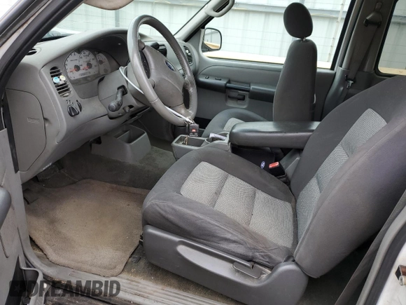 2003 Ford Explorer Sport XLS with VIN 1FMYU60E63UA24544, listed as a Copart auction lot 53888765 with 263,249 mi miles and Salvage title. Bid and sale history available at DreamBid. Image 7.