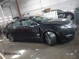 2013 Lincoln MKZ Hybrid z VIN 3LN6L2LU8DR818010, wystawiony jako IAAI lot #41363777 z przebiegiem 181 675 mil mil oraz . Historia ofert i sprzedaży dostępna na DreamBid. Obrazek 13.