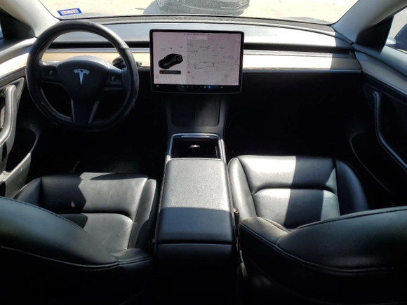 2021 Tesla Model 3 Standard Range Plus with VIN 5YJ3E1EA2MF986029, listed as a Copart auction lot 47848525 with 94,973 mi miles and Salvage Title. Bid and sale history available at carsss.com. Image 8.