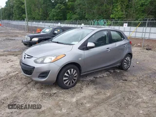 2013 Mazda 2 Sport with VIN JM1DE1KY9D0170519, listed as a IAAI auction lot 42212054 with 182,643 mi miles and . Bid and sale history available at DreamBid. Image 2.