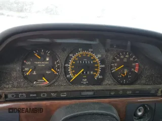 1989 Mercedes-Benz 560 with VIN WDBCA39E0KA469417, listed as a Copart auction lot 43929215 with 52,559 mi miles and Salvage Title. Bid and sale history available at DreamBid. Image 9.