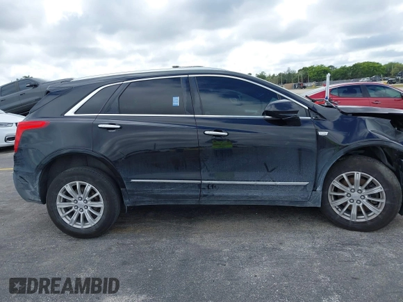 2018 Cadillac XT5 FWD z VIN 1GYKNARS3JZ137039, wystawiony jako IAAI lot #41667581 z przebiegiem 98 281 mil mil oraz . Historia ofert i sprzedaży dostępna na DreamBid. Obrazek 14.
