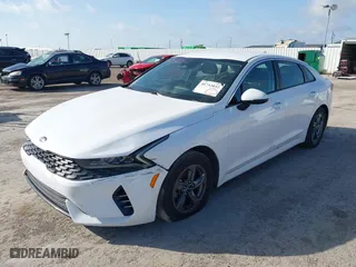 2021 Kia K5 LXS with VIN 5XXG14J23MG015129, listed as a IAAI auction lot 41752032 with 148,359 mi miles. Bid and sale history available at carsss.com. Image 6.