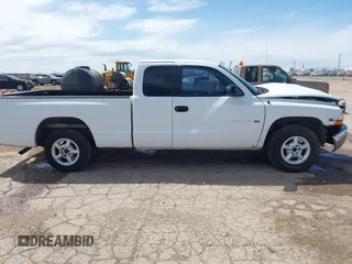 1999 Dodge Dakota SLT with VIN 1B7GL22X6XS186007, listed as a IAAI auction lot 41953254 with 322,541 mi miles. Bid and sale history available at carsss.com. Image 14.