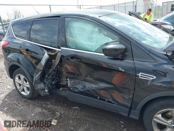 2013 Ford Escape SE with VIN 1FMCU0GX1DUA99040, listed as a IAAI auction lot 42084787 with 140,473 mi miles and . Bid and sale history available at DreamBid. Image 6.