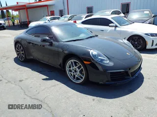 2018 Porsche 911 Carrera with VIN WP0AA2A90JS105492, listed as a IAAI auction lot 42750217 with 36,067 mi miles and . Bid and sale history available at DreamBid. Image 1.