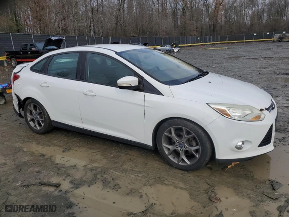 2014 Ford Focus SE with VIN 1FADP3F21EL202851, listed as a Copart auction lot 85258974 with 157,735 mi miles and Salvage Title. Bid and sale history available at carsss.com. Image 4.