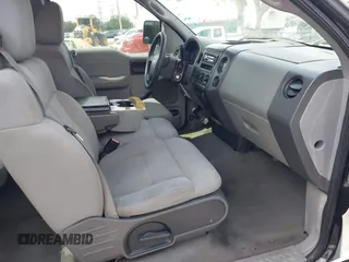 2004 Ford F-150 STX with VIN 1FTRX12W64NB79955, listed as a IAAI auction lot 41939508 with 198,742 mi miles. Bid and sale history available at carsss.com. Image 5.