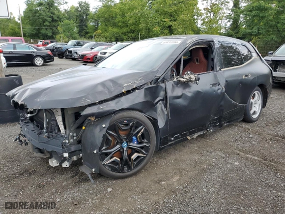 2023 BMW iX M60 with VIN WB533CF0XPCK81841, listed as a Copart auction lot 68497884 with 10,318 mi miles and Salvage Title. Bid and sale history available at carsss.com. Image 1.