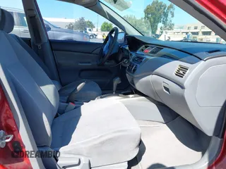 2004 Mitsubishi Lancer ES z VIN JA3AJ26E94U061361, wystawiony jako IAAI lot #42504174 z przebiegiem 204 127 mil mil oraz . Historia ofert i sprzedaży dostępna na DreamBid. Obrazek 5.