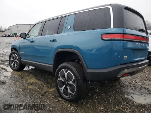 2024 Rivian R1S Adventure z VIN 7PDSGABA1RN031444, wystawiony jako Copart lot #43312765 z przebiegiem Nie podano mil oraz Szkody całkowita. Historia ofert i sprzedaży dostępna na DreamBid. Obrazek 2.