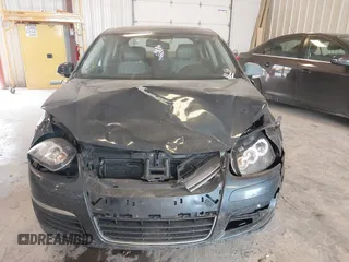 2006 Volkswagen Jetta 1.9L TDI z VIN 3VWDT71K26M624953, wystawiony jako IAAI lot #42420386 z przebiegiem 161 686 mil mil oraz . Historia ofert i sprzedaży dostępna na DreamBid. Obrazek 12.