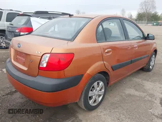 2009 Kia Rio LX with VIN KNADE223096543331, listed as a IAAI auction lot 41978544 with 166,749 mi miles and . Bid and sale history available at DreamBid. Image 4.