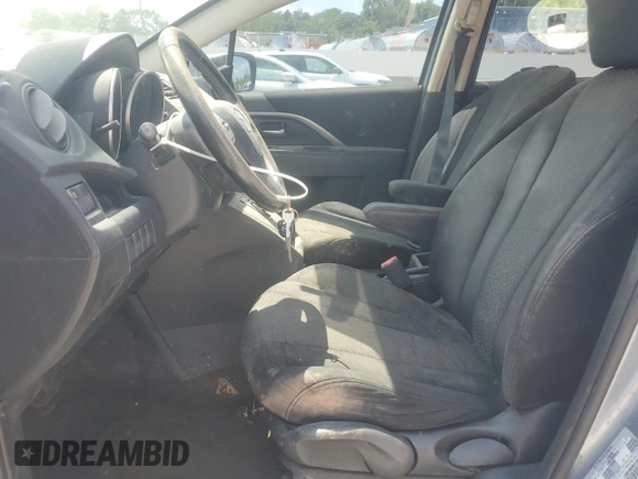 2012 Mazda 5 Touring with VIN JM1CW2CL5C0141969, listed as a Copart auction lot 62771735 with Not provided miles and Salvage title. Bid and sale history available at DreamBid. Image 7.