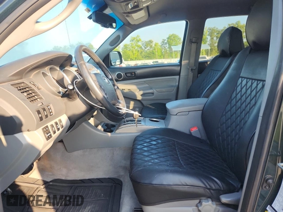 2010 Toyota Tacoma with VIN 3TMLU4EN8AM045702, listed as a Copart auction lot 63617625 with 138,247 mi miles and Salvage title. Bid and sale history available at DreamBid. Image 7.