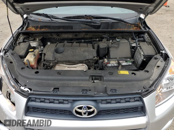 2012 Toyota RAV4 Sport with VIN JTMRF4DV5CD044821, listed as a Copart auction lot 61555935 with 94,301 mi miles and Salvage title. Bid and sale history available at DreamBid. Image 12.