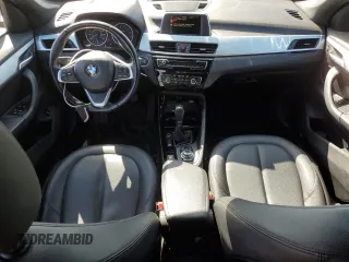 2016 BMW X1 xDrive28i z VIN WBXHT3C37G5E51737, wystawiony jako Copart lot #52441845 z przebiegiem 91 910 mil mil oraz Szkoda całkowita • Salvage title. Historia ofert i sprzedaży dostępna na DreamBid. Obrazek 8.