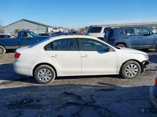2013 Volkswagen Jetta Sedan S with VIN 3VW2K7AJ6DM310317, listed as a IAAI auction lot 41682913 with 124,775 mi miles. Bid and sale history available at carsss.com. Image 13.