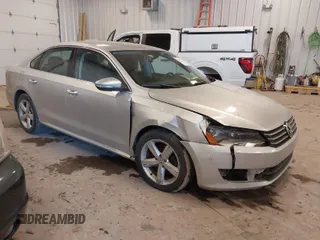2012 Volkswagen Passat SE with VIN 1VWBH7A31CC035908, listed as a IAAI auction lot 41535111 with 119,816 mi miles. Bid and sale history available at carsss.com. Image 1.
