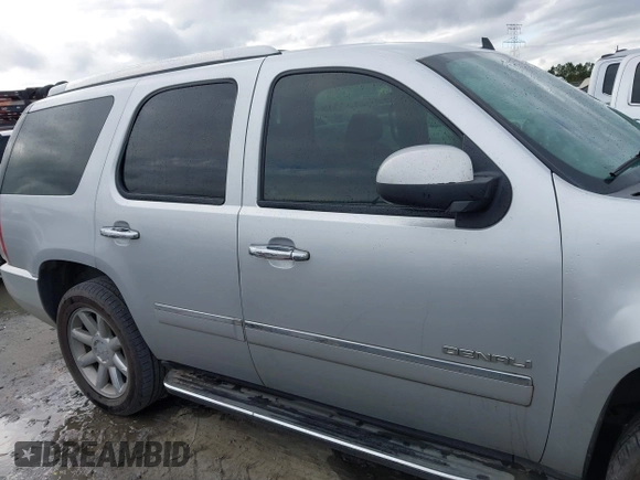 2012 GMC Yukon Denali with VIN 1GKS1EEF0CR256515, listed as a IAAI auction lot 41079993 with 207,470 mi miles. Bid and sale history available at carsss.com. Image 13.