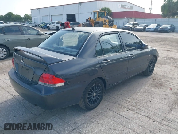 2004 Mitsubishi Lancer ES with VIN JA3AJ26E64U016149, listed as a IAAI auction lot 42438863 with 203,618 mi miles and . Bid and sale history available at DreamBid. Image 4.