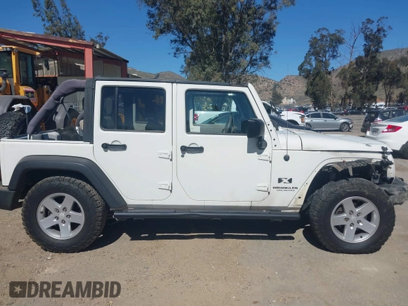 2007 Jeep Wrangler Unlimited X with VIN 1J4GB39147L133997, listed as a IAAI auction lot 41676009 with 110,849 mi miles and . Bid and sale history available at DreamBid. Image 13.