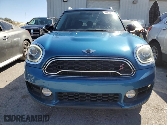 2018 MINI Countryman Cooper S с VIN WMZYT3C31J3E93921, выставлен на аукционе Copart как лот 49410385 с пробегом 65 657 миль миль и Списание • Salvage title. История ставок и продаж доступна на DreamBid. Изображение 5.