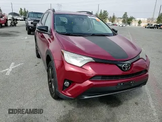 2018 Toyota RAV4 XLE with VIN 2T3WFREV0JW411011, listed as a Copart auction lot 58505825 with 91,787 mi miles and Salvage title. Bid and sale history available at DreamBid. Image 14.